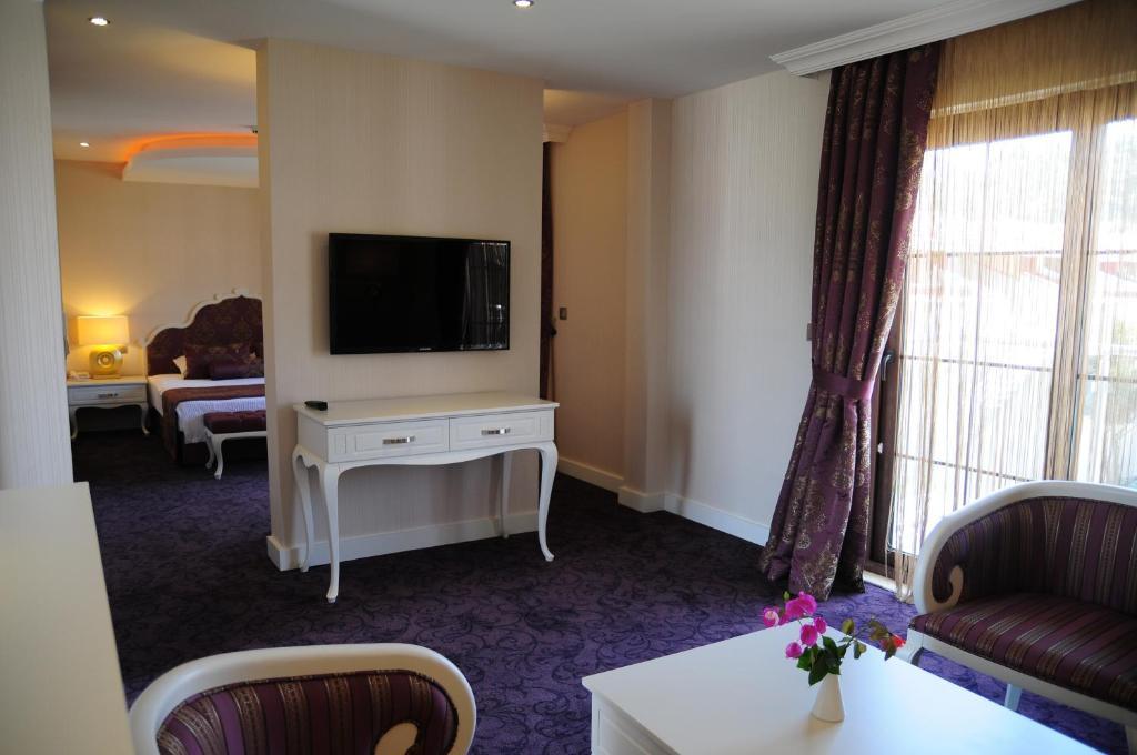 Han Deluxe Hotel Олюденіз Номер фото